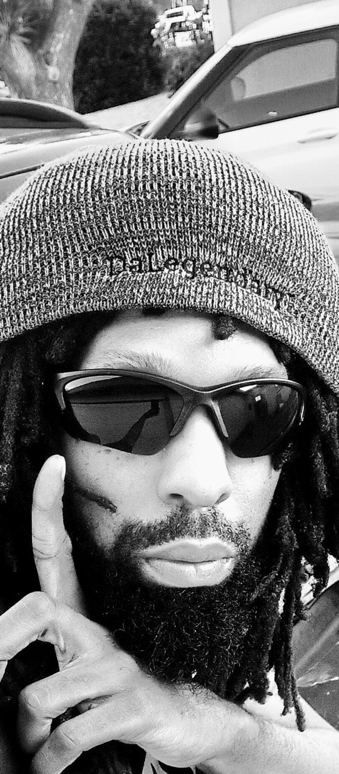 DaLegendary1 wearing Carbon Midnight sunglasses, black and white portrait